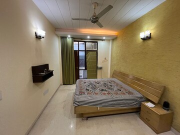 Bedroom in 3 BHK Builder Floor at Ansal Sushant Lok I, Sector 43 – for Rent