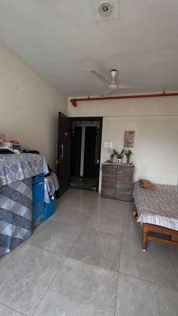 Living Room in 2 BHK Apartment at JP North Estella, Mira Road – for Sale