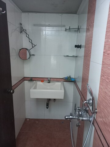 Bathroom in 2 BHK Apartment at Oakland Park, Andheri West – for Sale