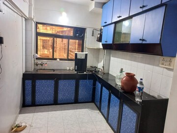 Kitchen in 2 BHK Apartment at Oakland Park, Andheri West – for Sale