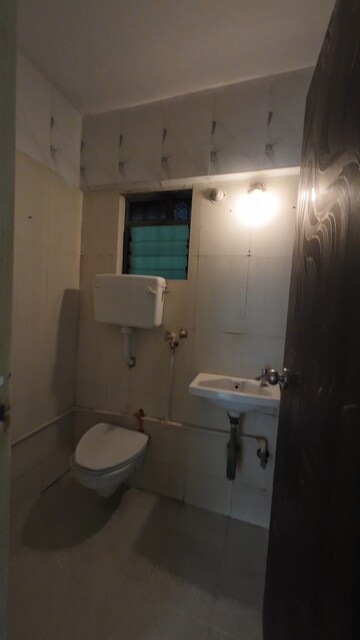 Bathroom in 2 BHK Apartment at Gaurav Woods, Mira Road – for Sale