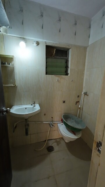 Bathroom in 2 BHK Apartment at Gaurav Woods, Mira Road – for Sale