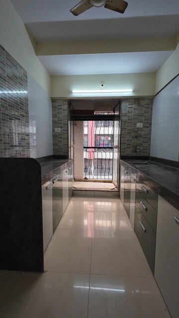 Kitchen in 2 BHK Apartment at Gaurav Woods, Mira Road – for Sale
