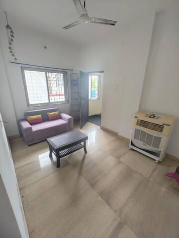 Living Room in 1 BHK Apartment at Kumar Palaash A, Wadgaon Sheri – for Rent