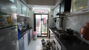 Kitchen in 1 BHK Apartment at RNA NG Canary, Mira Road – for Sale