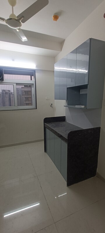 Kitchen in 2 BHK Apartment at Ashar Axis, Majiwada – for Rent