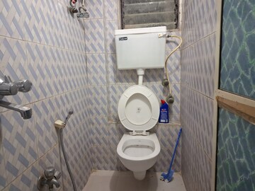 Bathroom in 1 BHK Apartment at Oshiwara Sai Siddhi CHS, Andheri West – for Rent