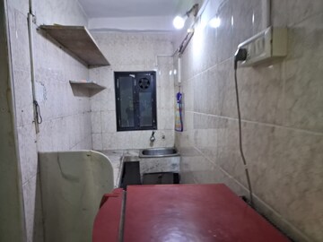 Bathroom in 1 BHK Apartment at Oshiwara Sai Siddhi CHS, Andheri West – for Rent