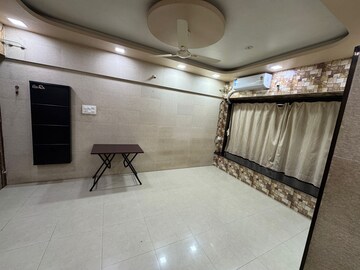Living Room in 1 BHK Apartment at Ahimsa Tower, Malad West – for Rent