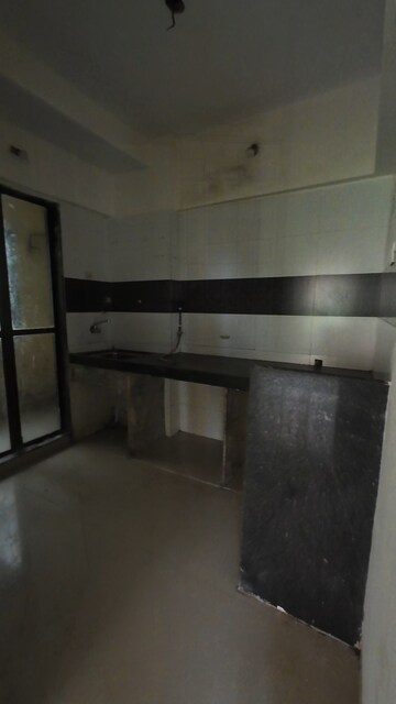 Kitchen in 2 BHK Apartment at Ravi Gaurav Aster, Mira Road – for Rent