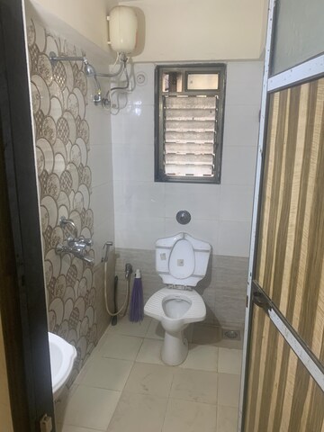 Bathroom in 1 BHK Apartment at Matru Aashish, Parel – for Rent