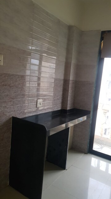 Bathroom in 1 BHK Apartment at Kohinoor Castles, Ambernath – for Rent