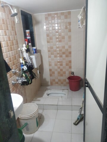 Bathroom in 1 BHK Apartment at Kohinoor Castles, Ambernath – for Rent