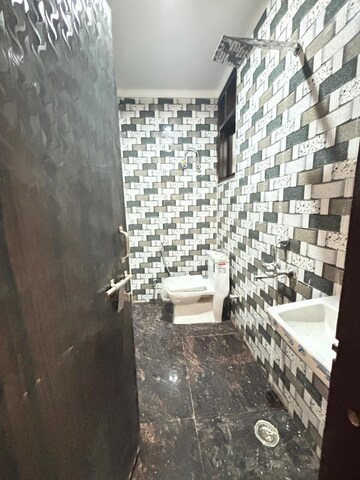 Bathroom in 1 BHK Apartment at Palm Residency Chhatarpur, Chattarpur – for Rent