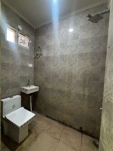 Bathroom in 1 BHK Apartment at Palm Residency Chhatarpur, Chattarpur – for Rent