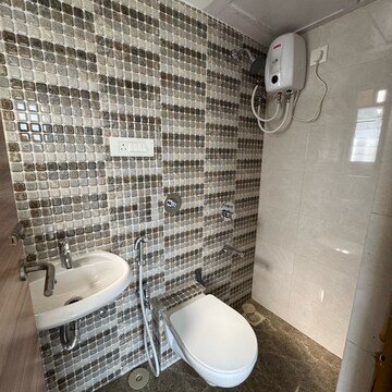 Bathroom in 1 BHK Apartment at Marathon NeoSkies, Kokan Nagar – for Rent