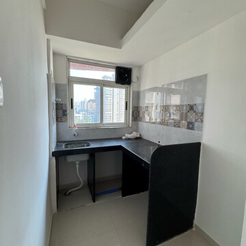 Kitchen in 1 BHK Apartment at Marathon NeoSkies, Kokan Nagar – for Rent