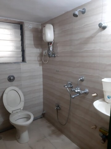 Bathroom in 1 BHK Apartment at Naupada – for Rent