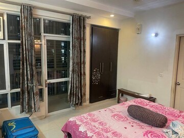 Bedroom in 4 BHK Apartment at Prateek Wisteria, Sector 77 – for Rent
