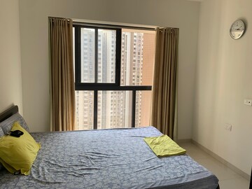 Bedroom in 2 BHK Apartment at Lodha Splendora River View, Ghodbunder Road – for Rent