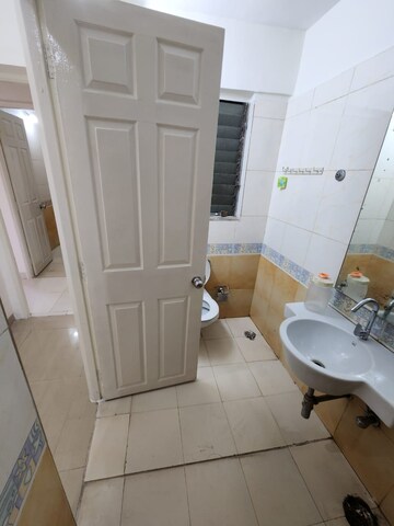 Bathroom in 2.5 BHK Apartment at NRI Complex Phase 2, Seawoods – for Rent