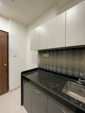 Kitchen in 2 BHK Apartment at Lodha Splendora, Ghodbunder Road – for Rent