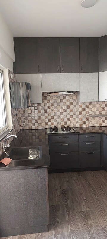 Kitchen in 2 BHK Apartment at SNN Raj Serenity, Begur Road – for Rent
