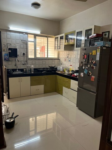 Kitchen in 2 BHK Apartment at Karan Woodz, Warje – for Sale