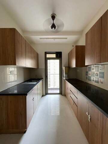 Kitchen in 2 BHK Apartment at Lodha Splendora, Ghodbunder Road – for Rent