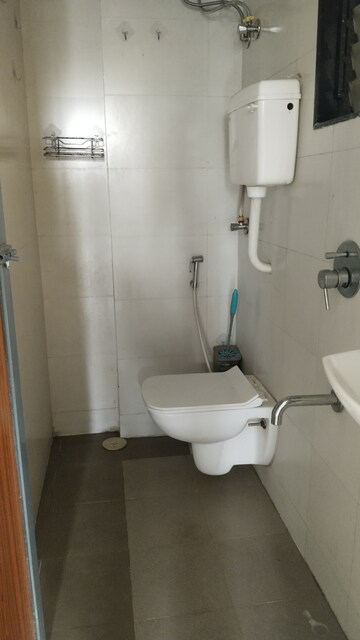 Bathroom in 1 BHK Apartment at Vistas CHS, Kavesar – for Rent