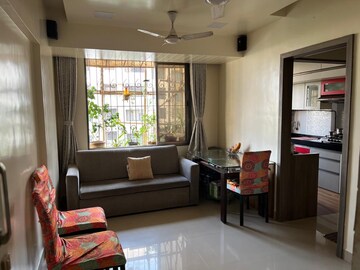 Living Room in 1 BHK Apartment at Triratnadeep CHS, Mulund East – for Sale