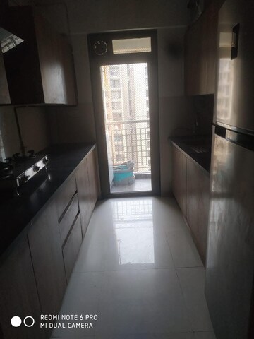 Kitchen in 2.5 BHK Apartment at Lodha Splendora, Ghodbunder Road – for Rent