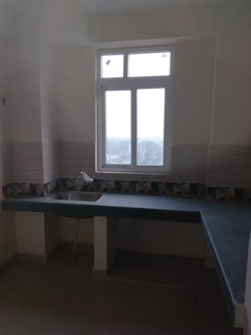 Kitchen in 2 BHK Apartment at Deva Road – for Sale