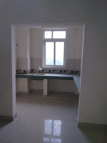 Kitchen in 2 BHK Apartment at Deva Road – for Sale