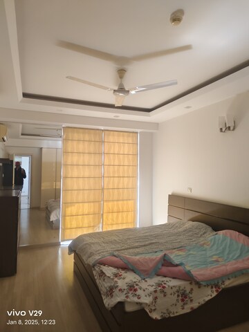Bedroom in 4 BHK Apartment at DLF Park Place, Sector 54 – for Rent