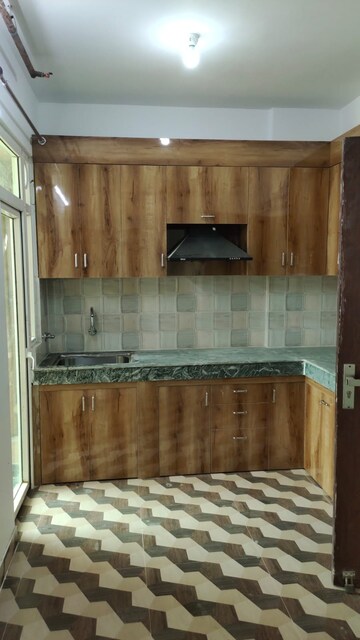 Kitchen in 3 BHK Apartment at High End Paradise II, Raj Nagar Extension – for Rent