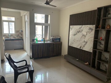 Living Room in 2 BHK Apartment at JKG Palm Resort, Raj Nagar Extension – for Rent