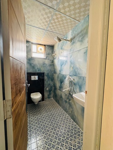 Bathroom in 3 BHK Builder Floor at CM Town Square, Mangyawas – for Sale