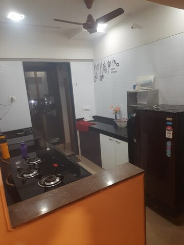 Kitchen in 1 BHK Apartment at Naupada – for Sale