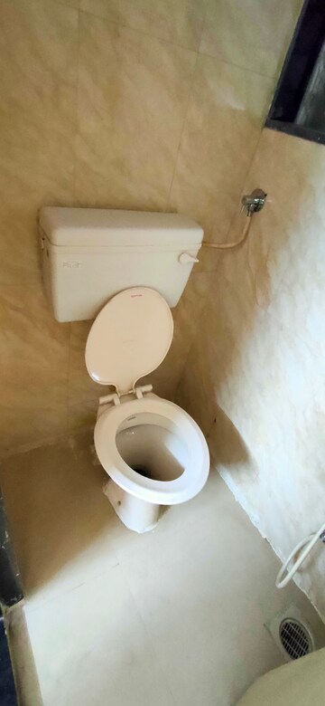 Bathroom in 1 BHK Apartment at Kshitija Shree Laxmi Residency, Byculla West – for Rent