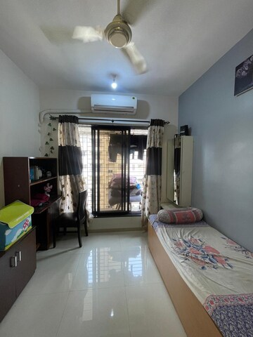 Bedroom in 2 BHK Apartment at Riverdale Tower, Andheri East – for Sale