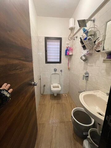 Bathroom in 2 BHK Apartment at Riverdale Tower, Andheri East – for Sale