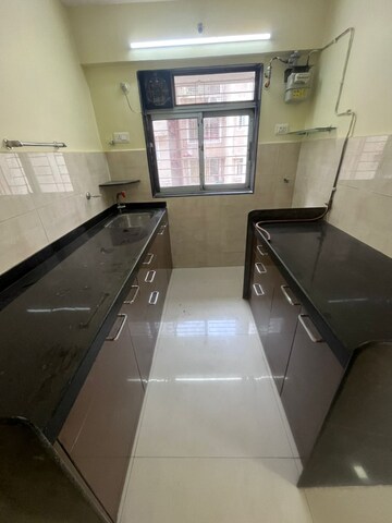 Kitchen in 2 BHK Apartment at Harsh CHS Tilak Nagar, Tilak Nagar – for Rent