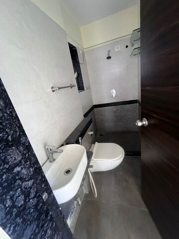 Bathroom in 2 BHK Apartment at Harsh CHS Tilak Nagar, Tilak Nagar – for Rent
