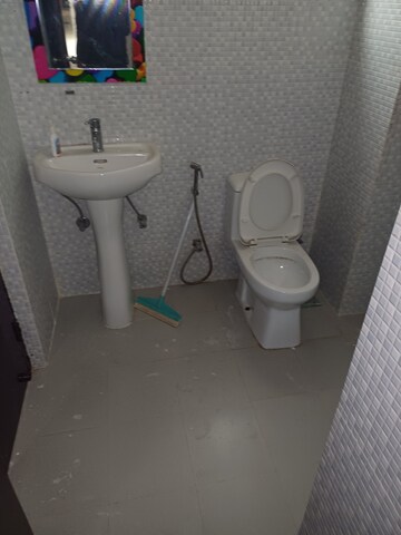 Bathroom in 3 BHK Apartment at Tulsiani Urban Woods, Sushant Golf City – for Rent
