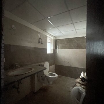 Bathroom in 4 BHK Apartment at Cosmos Express 99, Gopalpur – for Sale