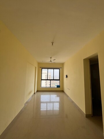Living Room in 1 BHK Apartment at Lodha Crown Quality Homes Dombivli, Dombivli East – for Rent