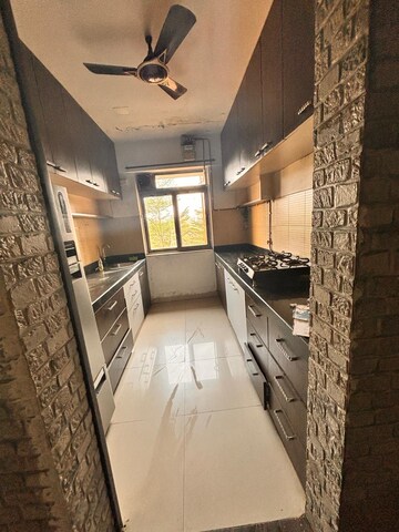 Kitchen in 2 BHK Apartment at Lodha Splendora, Ghodbunder Road – for Rent