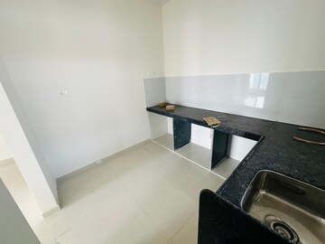 Kitchen in 2 BHK Apartment at Ashar Axis, Majiwada – for Sale