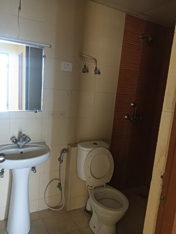 Bathroom in 2 BHK Apartment at Mahagun Mywoods, Sector 16c Greater Noida – for Rent